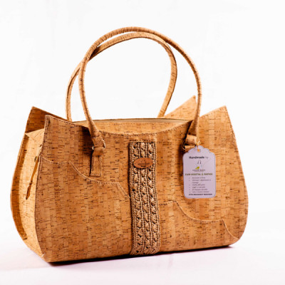 Lilah-Handbag embodies natural elegance with its unique combination of cork and crocheted raffia.
